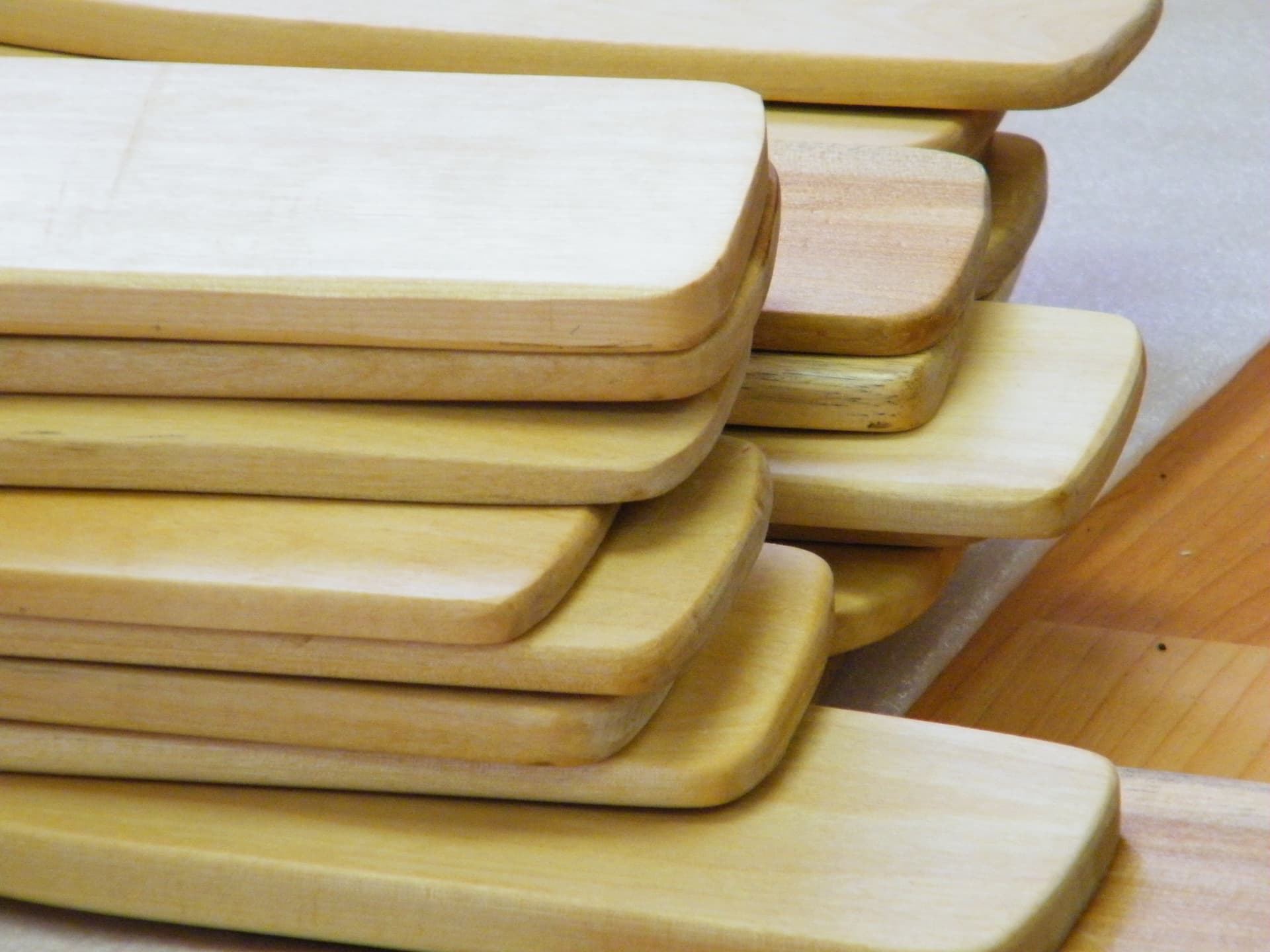 Finished paddles showcasing natural wood beauty